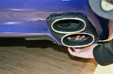 why are car manufacturers using fake exhausts